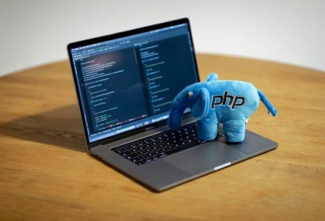 Php - blue elephant figurine on macbook pro