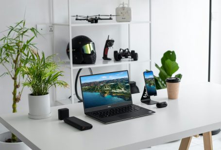 black-laptop-computer-on-white-table