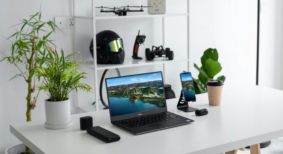 black-laptop-computer-on-white-table